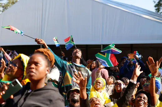 People gather on the day of the inauguration ceremony of South Africa's President elect Cyril Ramaphosa in Pretoria, South Africa, on June 19, 2024.